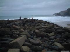 the collapsed harbour on st.agnes beach