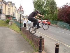 Drunk Radnor people watching someone backwheel a wall.